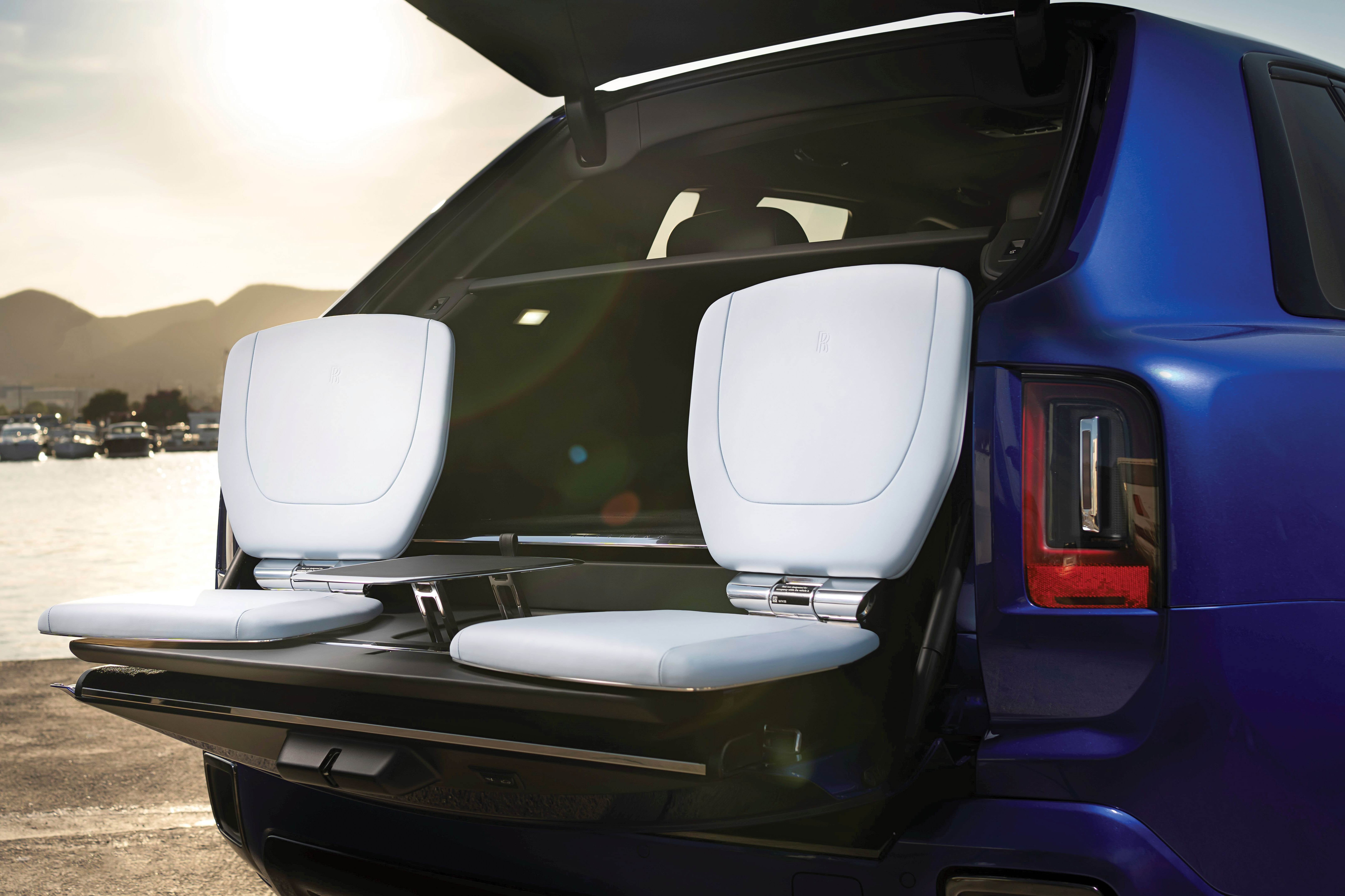 rolls royce cullinan black badge in field